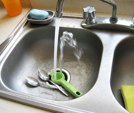 How do you reset a garbage disposal?
